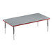 A rectangular grey Correll activity table with black metal legs and a red edge.