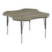 A rectangular Correll activity table with a Driftwood laminate top and metal legs.