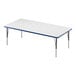 A white rectangular Correll activity table with blue trim.