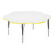 A white Correll activity table with a yellow edge.