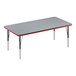 A rectangular grey Correll activity table with black and red legs.