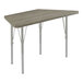 A trapezoid-shaped Correll activity table with silver legs and a New England driftwood top.