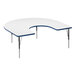 A white Correll horseshoe activity table with a blue edge.