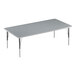 A rectangular Correll activity table with gray top and metal legs.