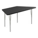 A black trapezoid activity table with silver legs.