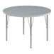 A Correll round activity table with gray top and silver legs.