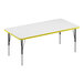 A white rectangular activity table with a yellow edge.