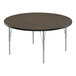 A Correll round activity table with metal legs and a dark wood top.