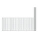 A white wire shelving unit with four metal grid shelves.