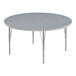 A Correll round table with a gray top and metal legs.