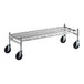 A Regency stainless steel wire dunnage rack with wheels.