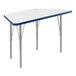 A white and blue trapezoid table top with silver legs and blue T-Mold.