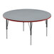 A round Correll activity table with a gray top and red T-molded edge and black legs.