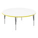 A white Correll round activity table with yellow edges.