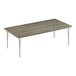A rectangular Correll activity table with silver metal legs and a driftwood laminate top.