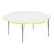 A white Correll activity table with a yellow edge.