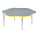 A Correll gray and yellow table with a flower design on the top.