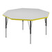 A white and yellow Correll octagon activity table top with yellow T-mold.