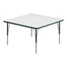 A white square table with a green edge and black legs.