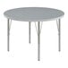A round gray Correll activity table with silver legs and gray trim.