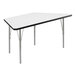 A white trapezoid table with a black edge.