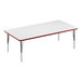 A rectangular white Correll activity table with a red edge.