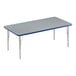 A rectangular table with a grey top and blue edge on silver legs.