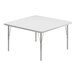 A white square Correll activity table with metal legs.