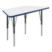 A white and blue trapezoid table top with black legs and blue T-mold.