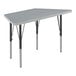 A grey trapezoid activity table with black legs.