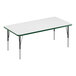 A white rectangular Correll activity table with a green edge.
