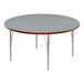 A Correll round gray table with a red edge.