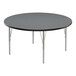 A round Correll activity table with a grey top and black border on silver legs.