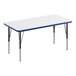 A white rectangular Correll activity table with black legs and a blue edge.