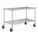 A metal shelf with wheels.