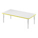 A white rectangular Correll activity table with a yellow edge.