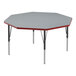 A gray Correll octagon activity table with black legs and red trim.