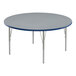 A round Correll activity table with a gray granite top and metal legs with a blue edge.