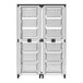 A black and white Luxor storage cabinet with whiteboards and pegboards and large bins.