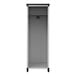 A white and black metal Luxor mobile teacher storage cabinet with tabletop.