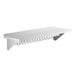 A stainless steel wall-mounted shelf with metal hooks.