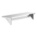 A white metal rack with a white shelf and hooks.