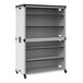 A white metal Luxor double stacked classroom bookcase with black shelves on wheels.