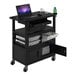 A black Luxor Deluxe Teacher Cart with a laptop on top.
