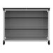 A black steel Luxor modular classroom bookcase with black and white shelves.