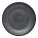 A close-up of a black matte porcelain deep coupe plate with a silver rim.