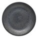 A close-up of a black matte porcelain coupe plate from Libbey.