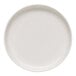 A white Libbey Driftstone porcelain coupe plate with a speckled surface.