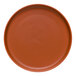 A close-up of a Libbey Driftstone clay satin matte porcelain plate with a rim.