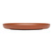 A brown Libbey Driftstone porcelain coupe plate with a matte finish and no rim.